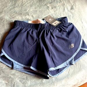 NWT, New Balance running shorts, dk blue/lt blue trim, drawstrings at waist